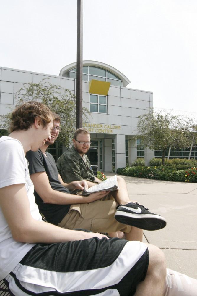 GVL/Andrea Baker
Art students Nick Freeman, Spencer Santa Coloma and Joe Chaney pass the time before class at the Calder Art Center.