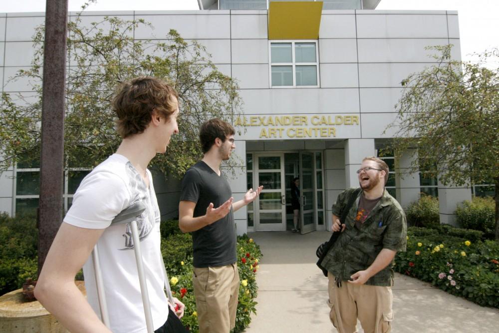 GVL/Andrea Baker
Art students Nick Freeman, Spencer Santa Coloma and Joe Chaney pass the time before class at the Calder Art Center.