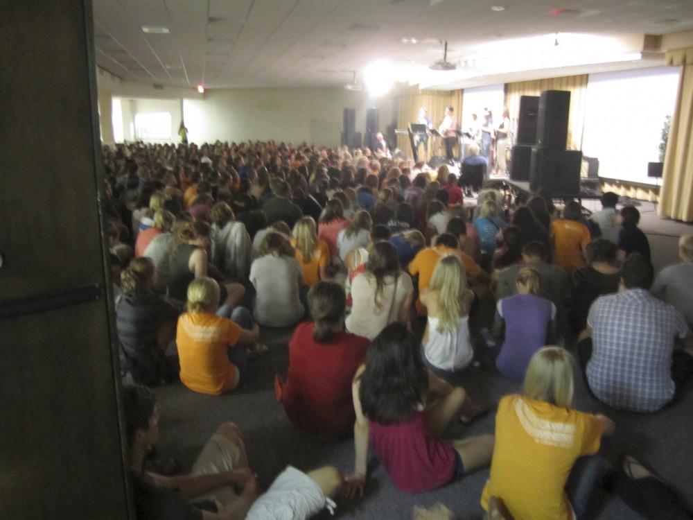 GVL/ Elizabeth Balboa
Students listen band preform during the Campus Praise Rally put on by Campus Ministry on Monday.