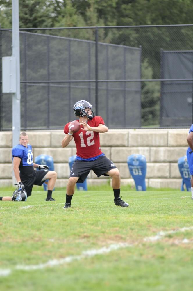 GVL/ Rane Martin
Sophomore quarterback Heath Parling makes a few warm-up throws during practice on Tuesday.