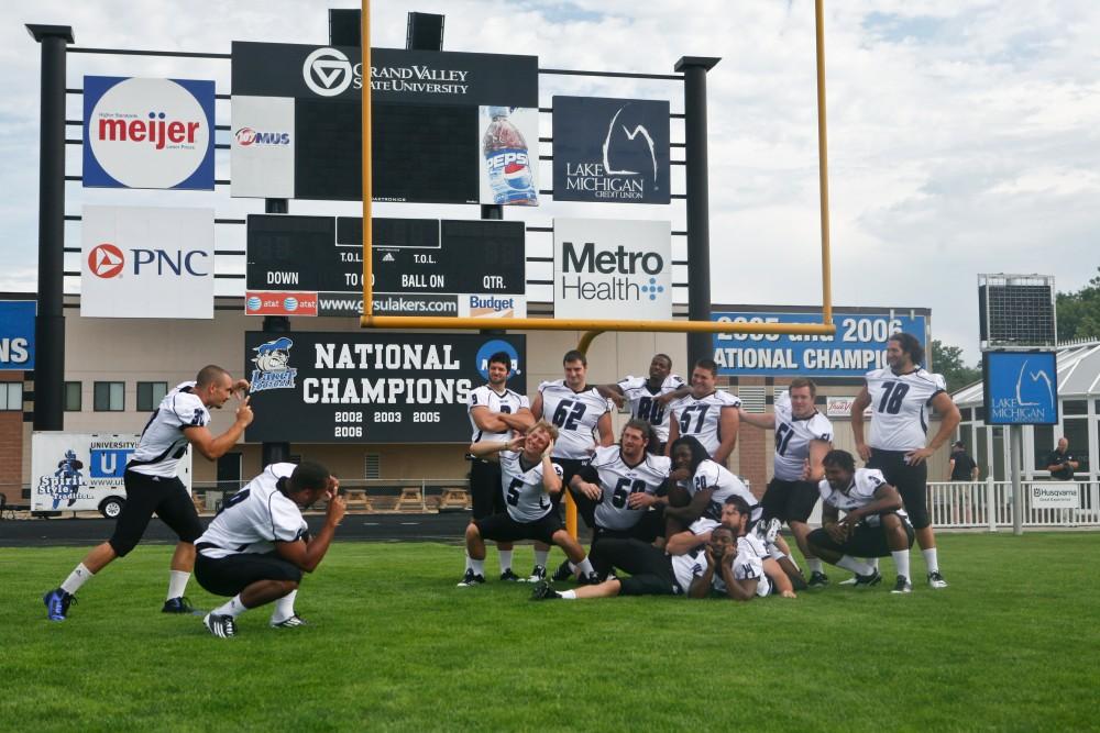 The Grand Valley State University football team seniors pose for the press during yesterdays Laker media day. 