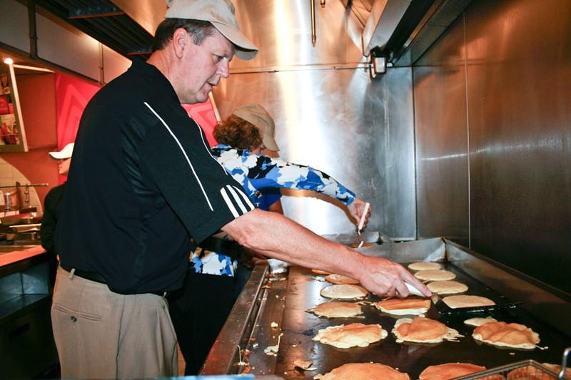 GVL Archive
President Haas flips pancakes during Pancakes with Presidents on Family Weekend. This years Family Weekend will feature dueling pianos