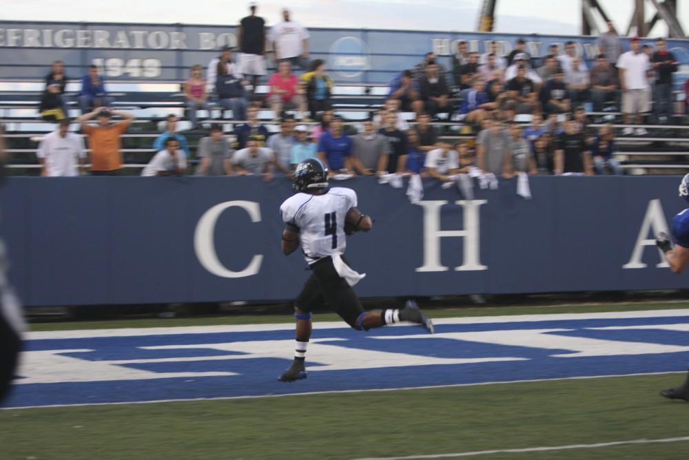 GVL/ Brady Frederickson
Junior wide receiver Charles Johnson hauls in a 71 yard pass late in the second quarter during their away game against Hillsdale on Saturday.