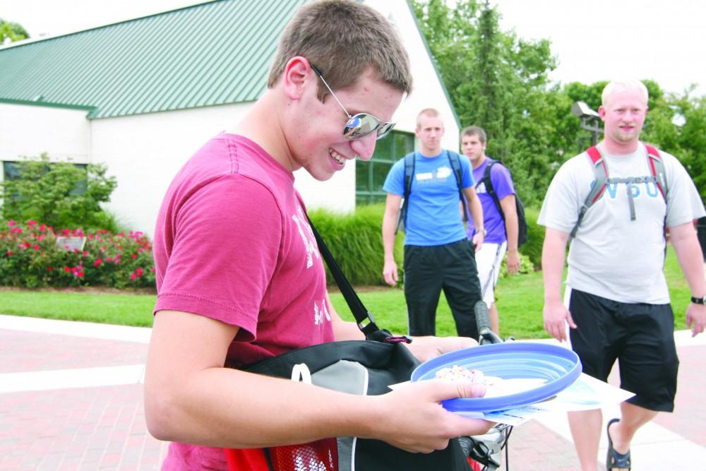 GVL/ Andrea Baker
A student is excited to dig into his free ice cream during the Future Alumni Association Ice Cream Social.