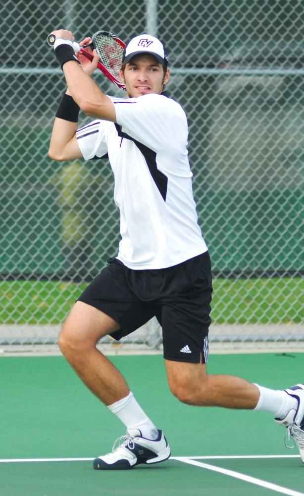 GVL Archive 
Senior Marc Roesslein moves to return the serve