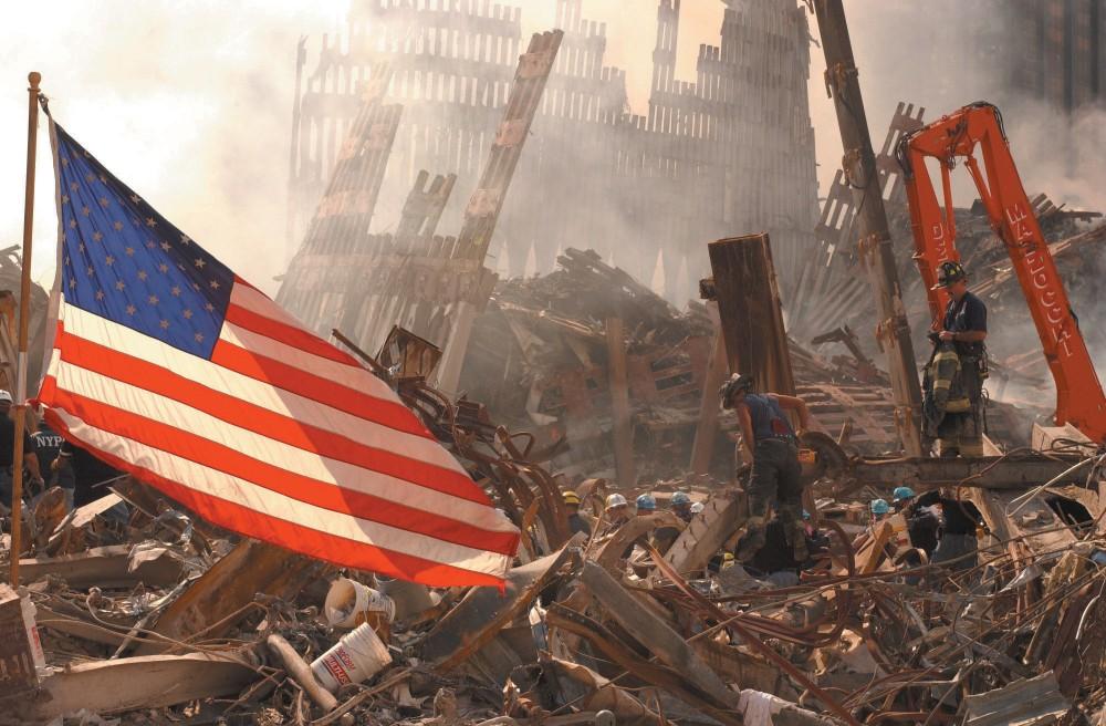 New York City, NY, September 16, 2001 -- FEMA Urban Search and Rescue teams work to clear rubble and search for survivors at the World Trade Center.

Photo by Andrea Booher/ FEMA News Photo