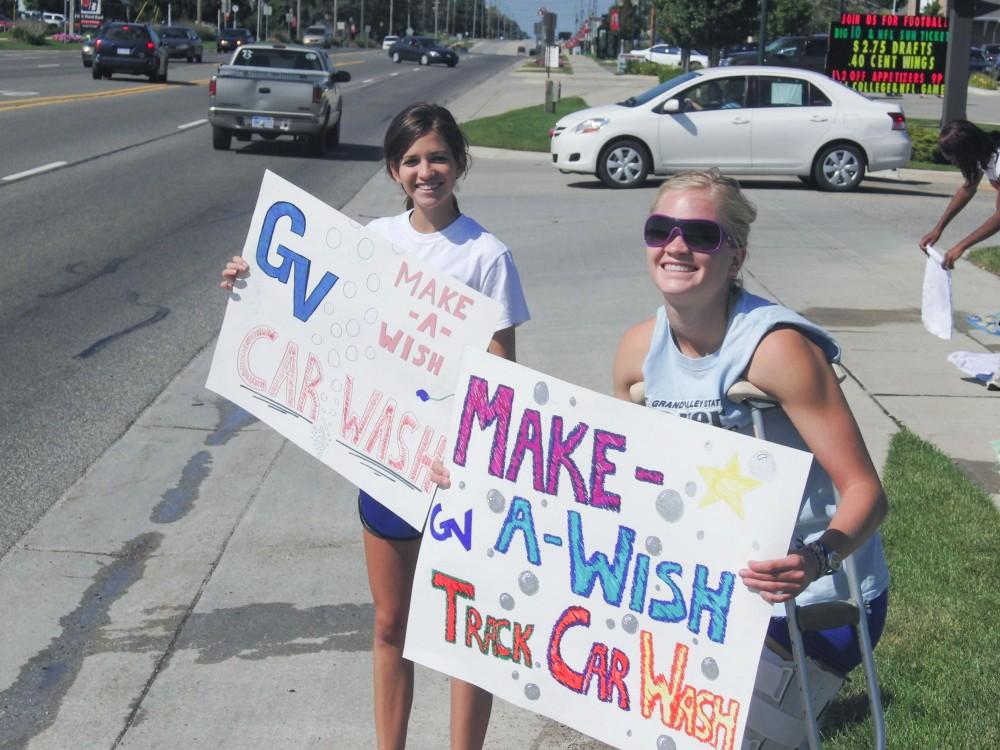 Courtesy Photo / Steve Jones
Members of the Track and Cross Country teams held a car a wash throughout Allendale and Standale to support the Make A Wish Foundation.