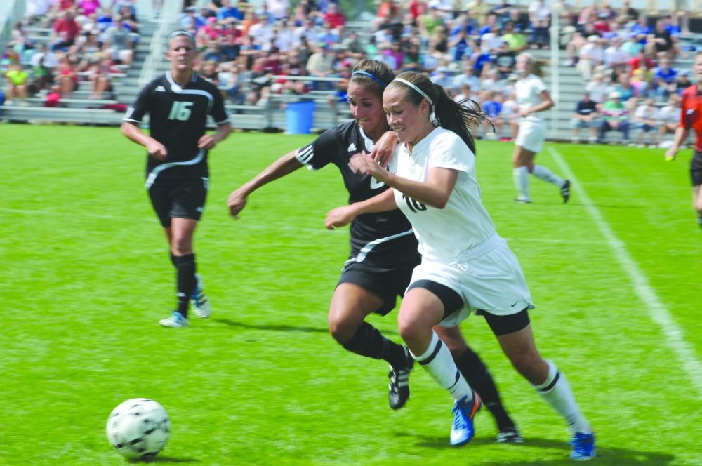 GVL/ Rane Martin
Senior defender Megan Brown fights for possession during their game against Saginaw Valley on Sunday.