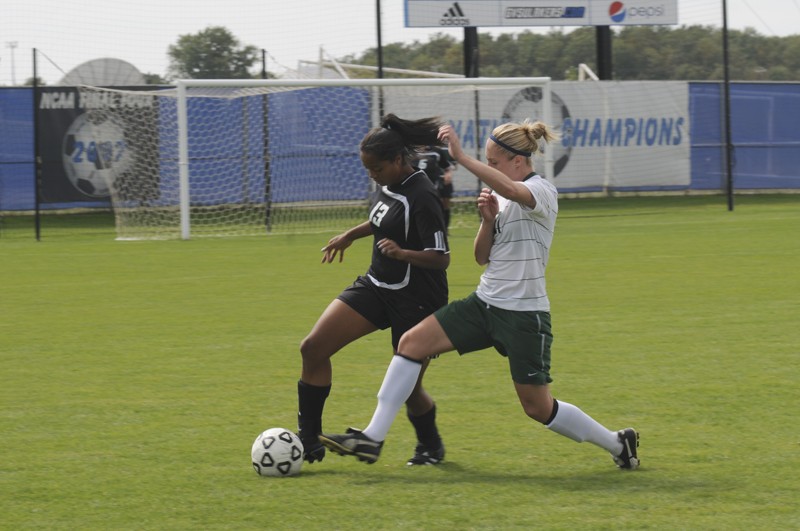 GVL/ Rane Martin
Junior forward Maria Brown moves past her opponent during their game against Northern Michigan University on Sunday.