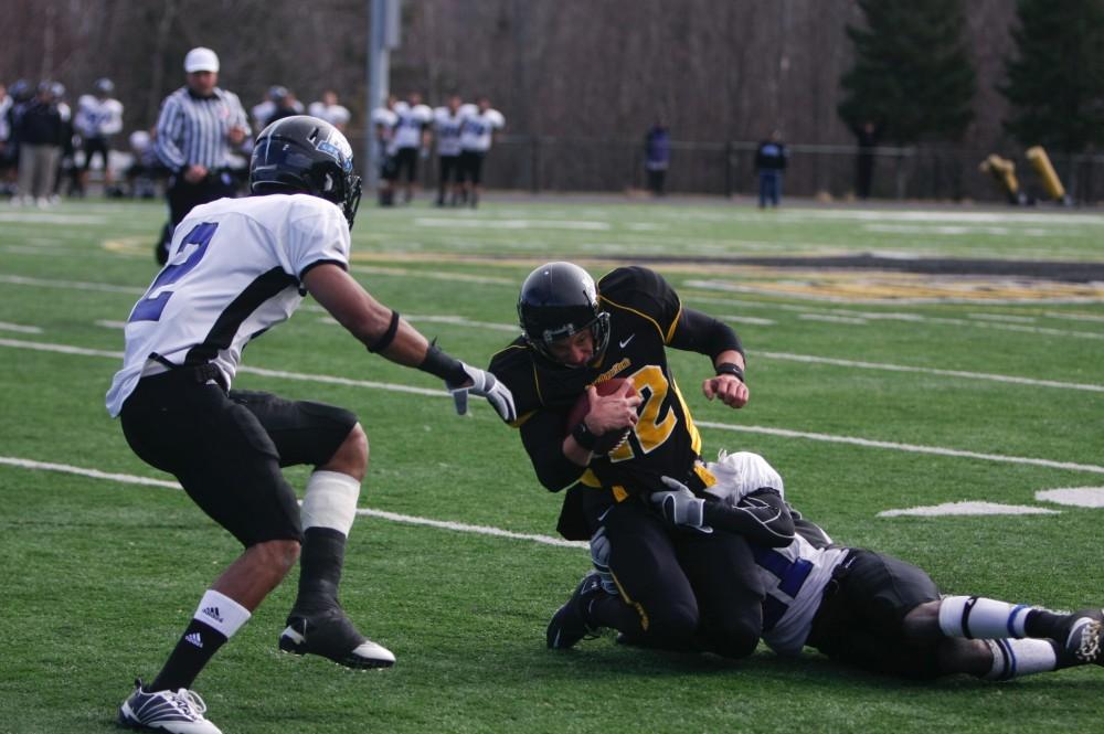 GVL Archive
Senior Linebacker Brad Howard makes a tackle in last years match up between Northern and GVSU. This year the Lakers were victorious 42-7