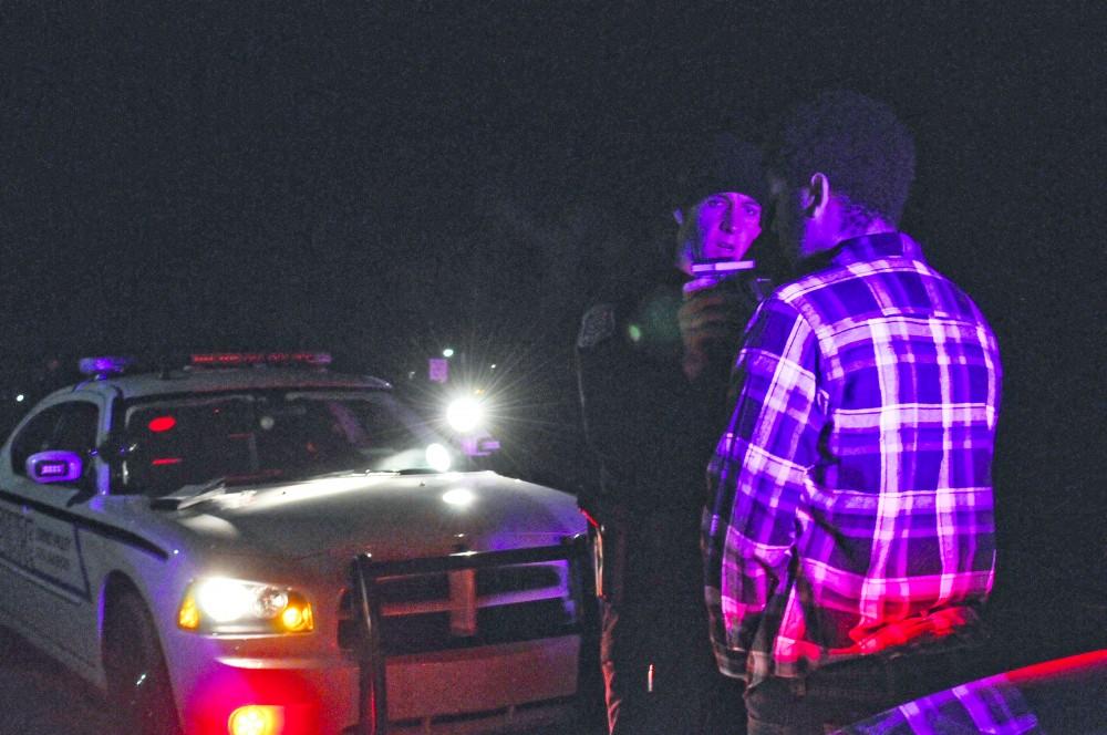 GVL / Anya Zentmeyer
Officer Stoll administers a preliminary breath test