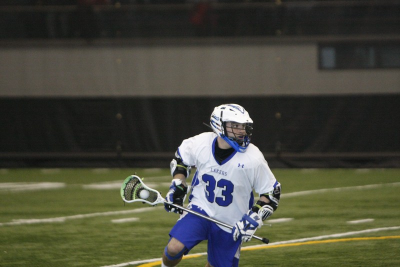 GVL Archive 
Junior CJ Scholl carries the the ball down the field during a past match. 