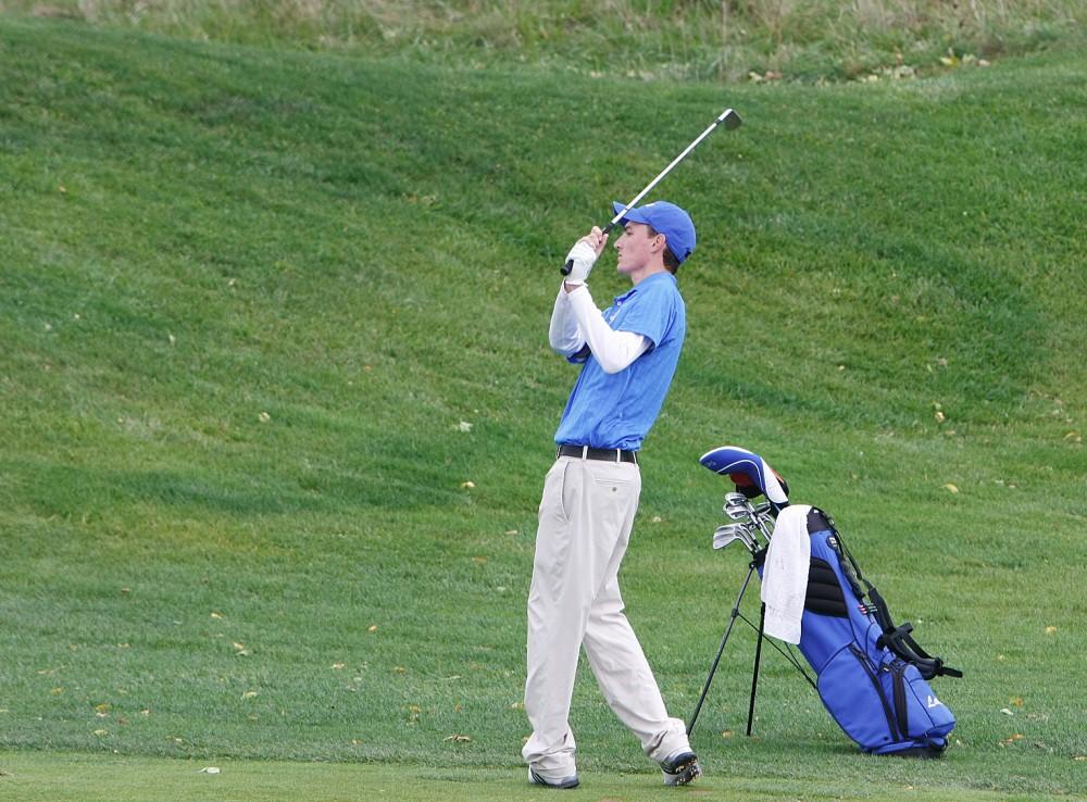 GVL Archive
Senior Travis Shooks lines up his putt during a past match.