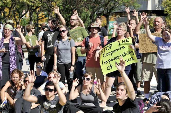 Courtesy Photo/ mlive.comDemonstrators gather in downtown Grand Rapids as a part of Occupy Grand Rapids.