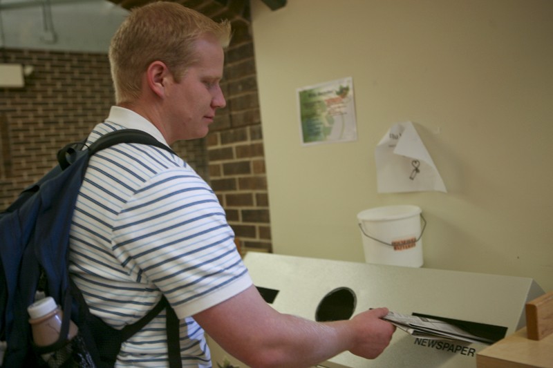 GVL/ Rane Martin
Junior criminal justice major Matt Zwiers does his part by recycling his issue of the Lanthorn.