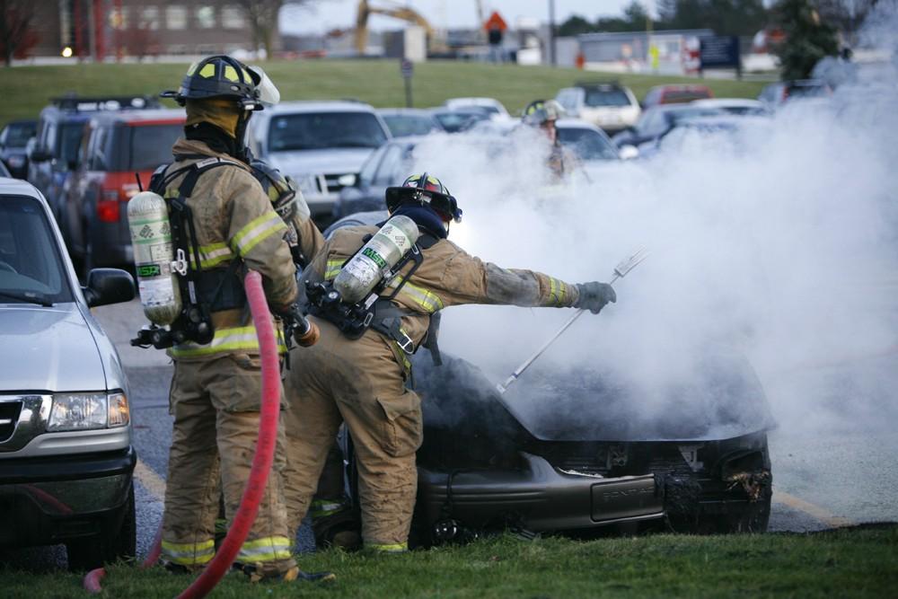 GVL / Eric Coulter
Allendale Fire FIghters responded to a car fire that took place in the parking lot near the Fieldhouse. Grand Valley State Police were unavailable for comment as to the cause of the fire. 