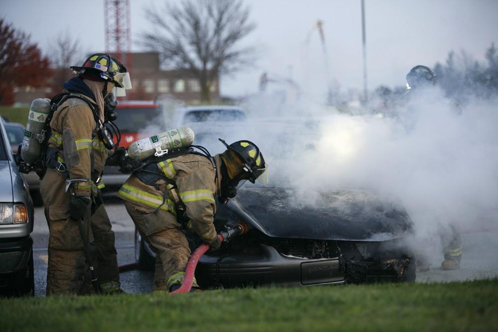 GVL / Eric Coulter
Allendale Fire FIghters responded to a car fire that took place in the parking lot near the Fieldhouse. Grand Valley State Police were unavailable for comment as to the cause of the fire. 