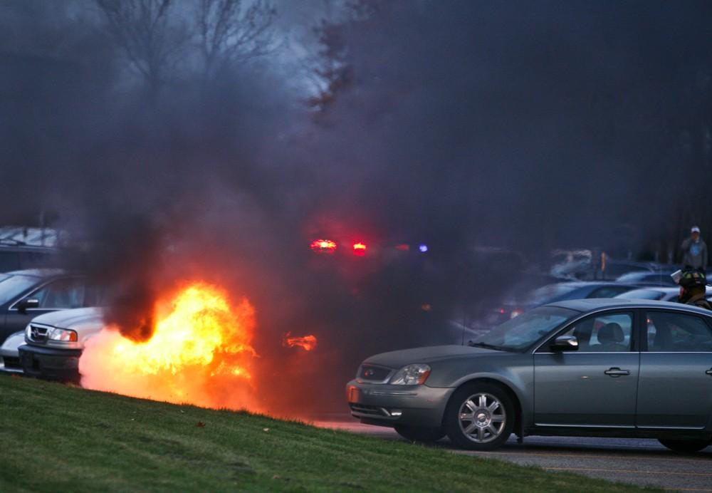 GVL / Eric Coulter
Allendale Fire FIghters responded to a car fire that took place in the parking lot near the Fieldhouse. Grand Valley State Police were unavailable for comment as to the cause of the fire. 