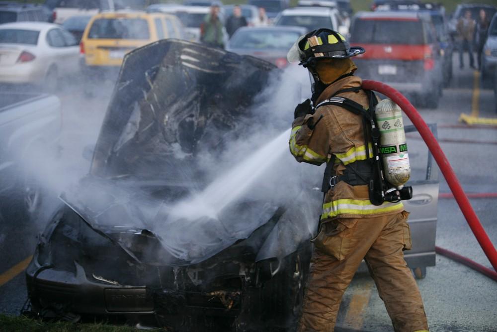 GVL / Eric Coulter
Allendale Fire FIghters responded to a car fire that took place in the parking lot near the Fieldhouse. Grand Valley State Police were unavailable for comment as to the cause of the fire. 