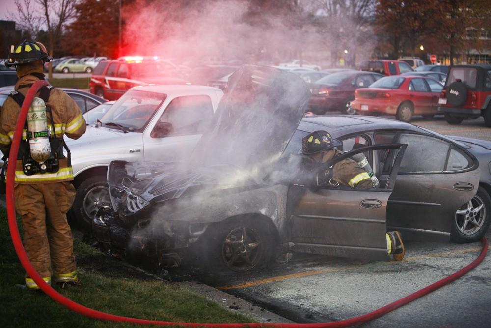 GVL / Eric Coulter
Allendale Fire FIghters responded to a car fire that took place in the parking lot near the Fieldhouse. Grand Valley State Police were unavailable for comment as to the cause of the fire. 