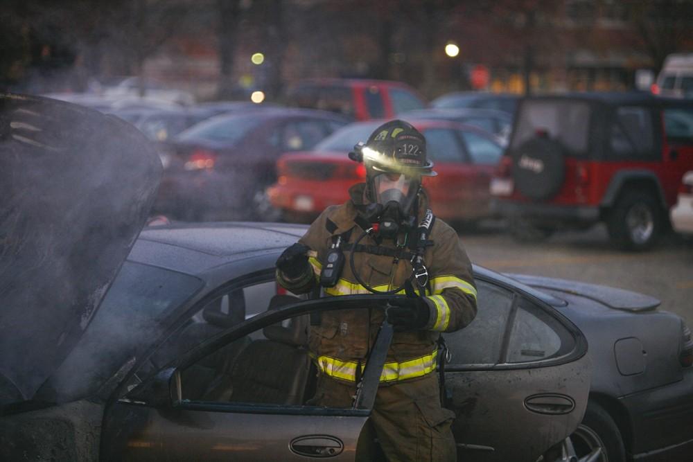 GVL / Eric Coulter
Allendale Fire FIghters responded to a car fire that took place in the parking lot near the Fieldhouse. Grand Valley State Police were unavailable for comment as to the cause of the fire. 