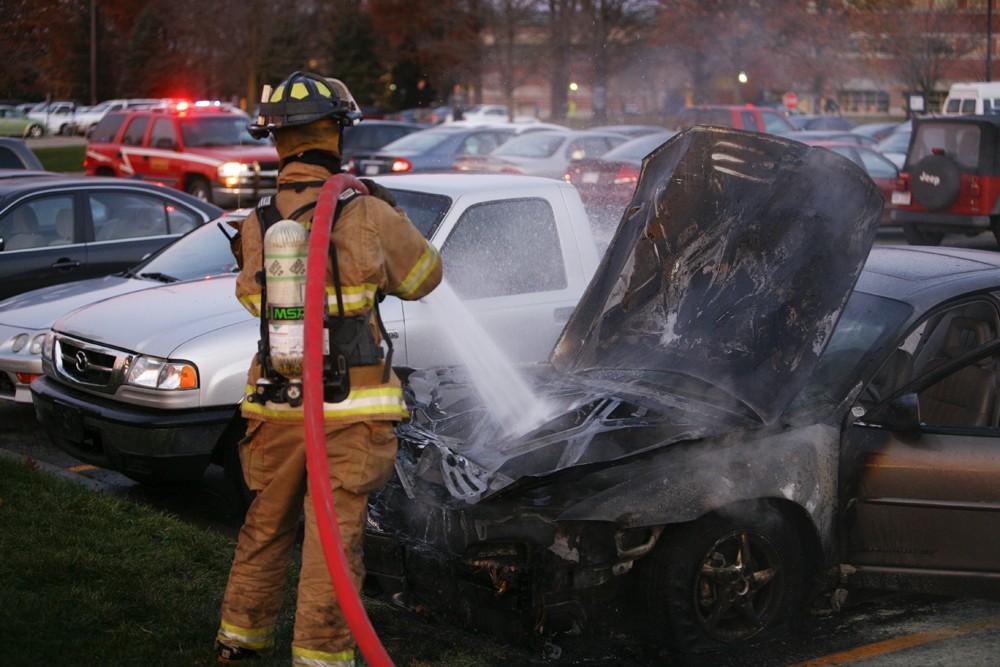 GVL / Eric Coulter
Allendale Fire FIghters responded to a car fire that took place in the parking lot near the Fieldhouse. Grand Valley State Police were unavailable for comment as to the cause of the fire. 