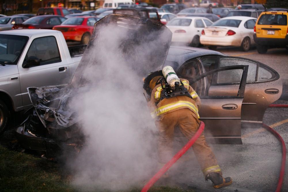 GVL / Eric Coulter
Allendale Fire FIghters responded to a car fire that took place in the parking lot near the Fieldhouse. Grand Valley State Police were unavailable for comment as to the cause of the fire. 