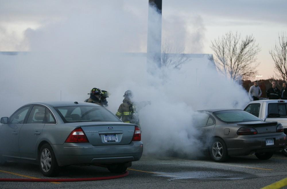 GVL / Eric Coulter
Allendale Fire FIghters responded to a car fire that took place in the parking lot near the Fieldhouse. Grand Valley State Police were unavailable for comment as to the cause of the fire. 