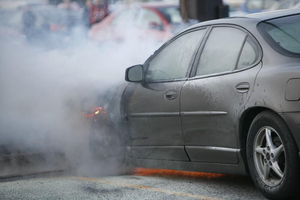 GVL / Eric Coulter
Allendale Fire FIghters responded to a car fire that took place in the parking lot near the Fieldhouse. Grand Valley State Police were unavailable for comment as to the cause of the fire. 