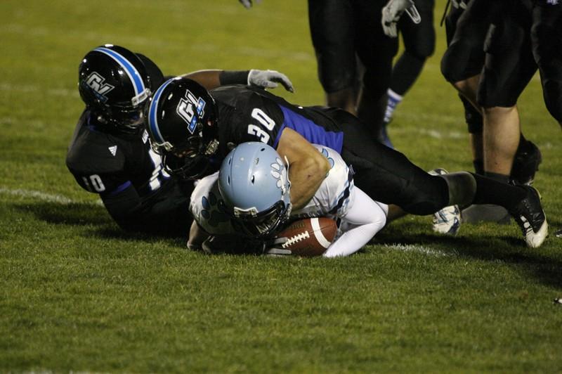 GVL Archive
Senior Zach Breen and sophomore Michael Hatcher team-up to tackle their opponent during last year's game against Northwood University.