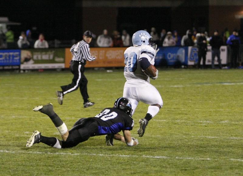 GVL Archive
Senior free safety Zach Breen dives for the legs of his opponent during last year's game against Northwood University.