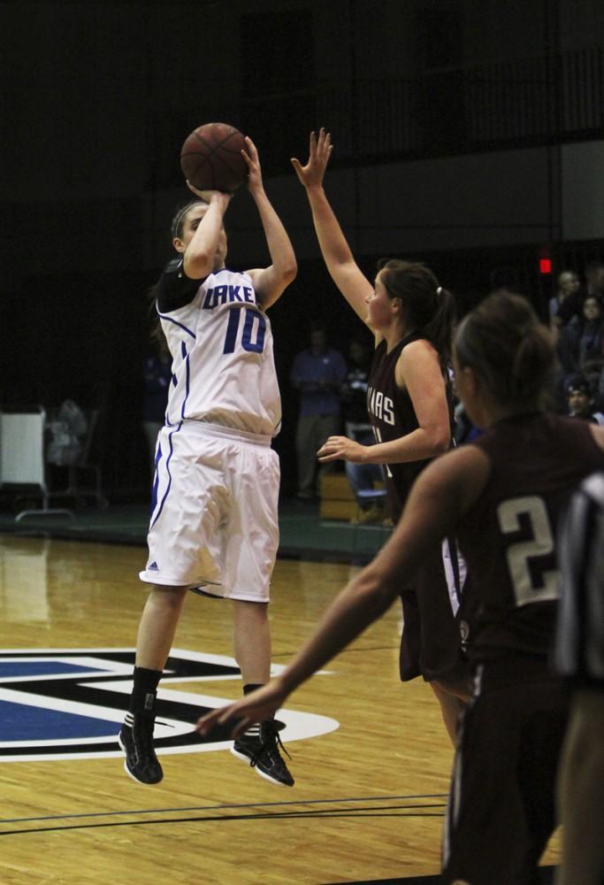 GVL / Robert Mathews / Forward Kellie Watson (10) taking the open jump shot.