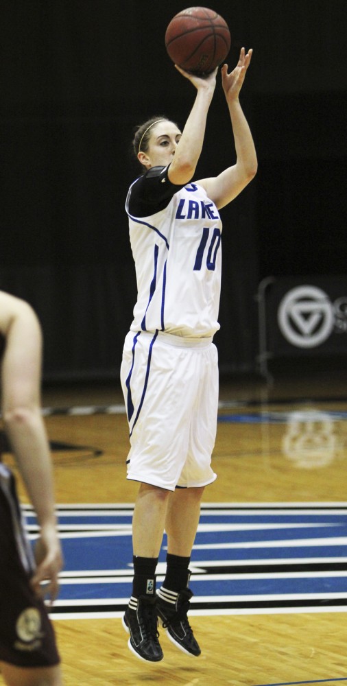 GVL / Robert Mathews / Forward Kellie Watson (10) taking a wide open jump shot.