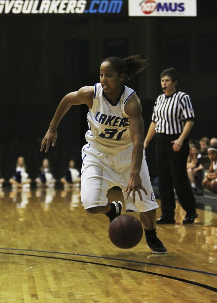 GVL / Robert Mathews / Forward Briauna Taylor (31) taking the ball in for a layup