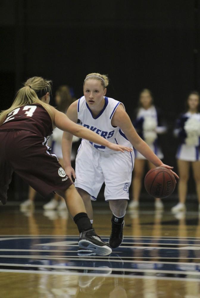 GVL / Robert Mathews / Meryl Cripe (12) looking to dribble past a defender.