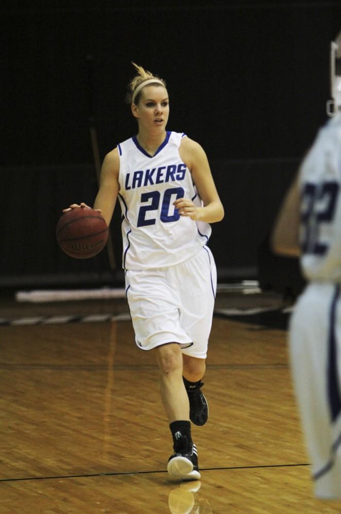 GVL / Robert Mathews / Center Alex Stelfox (20) taking the ball up court.