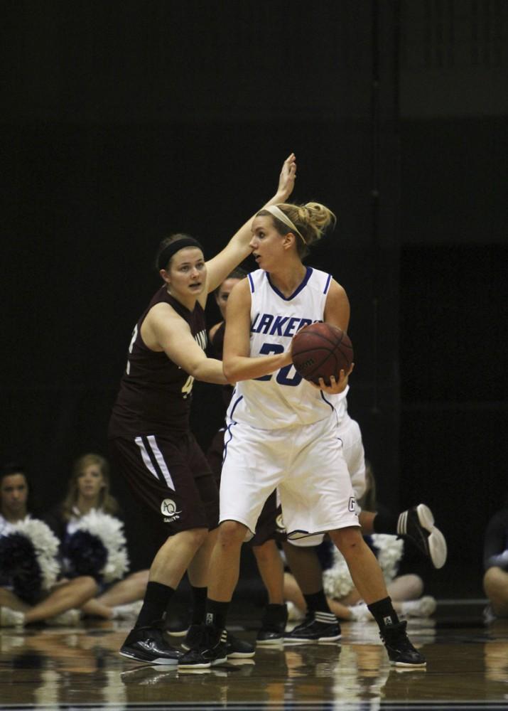 GVL / Robert Mathews / Center Alex Stelfox (20) guarding the ball against a defender. 