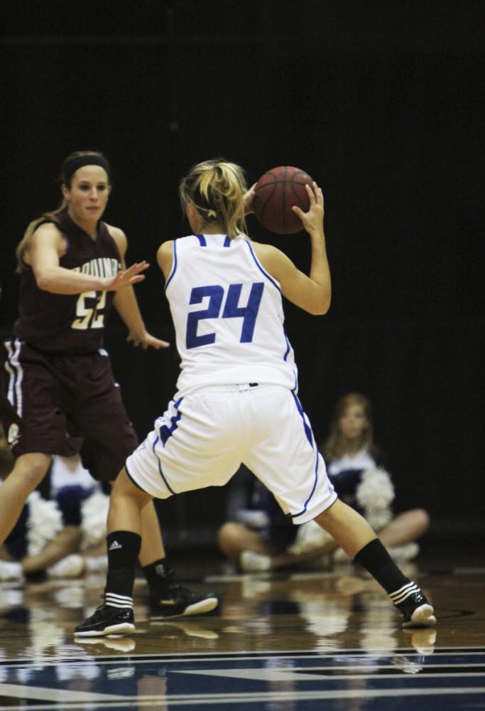 GVL / Robert Mathews / Forward Kara Crawford (24) getting ready for a jump shot.