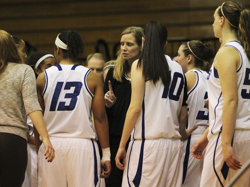 GVL / Robert Mathews / Head coach Janel Burgess talking to the team during a time out.