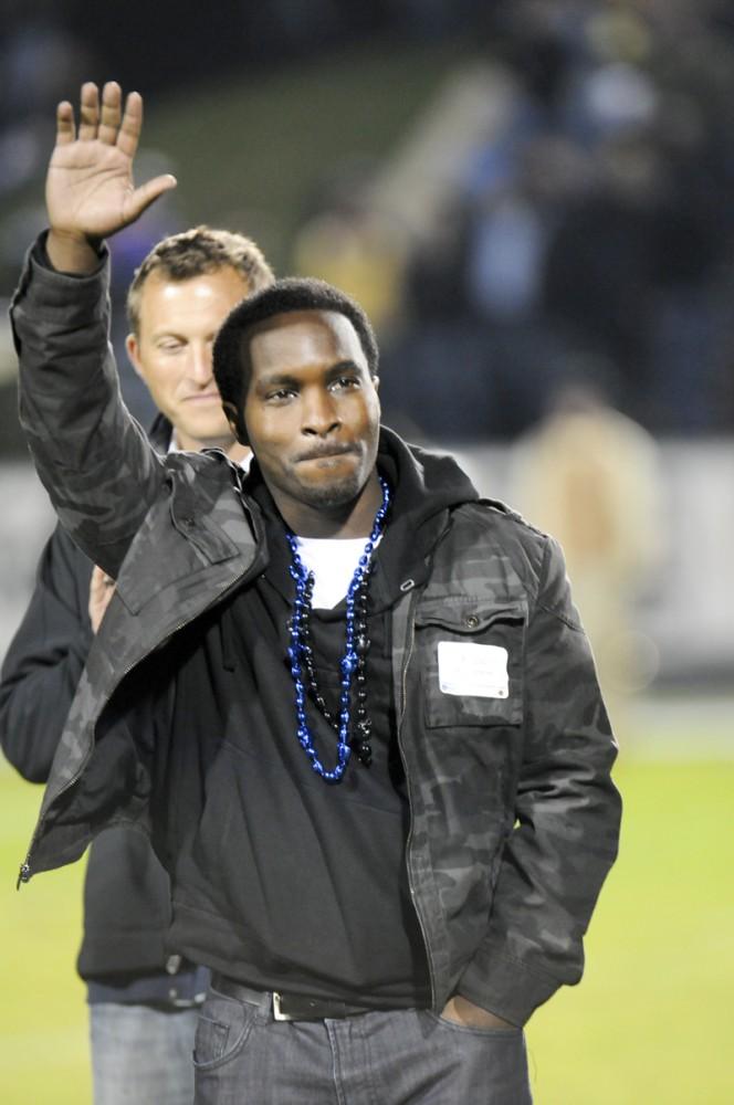 GVL/ Eric Coulter
Hall of Fame inductee Reggie Spearmon greets the crowd after being announced during the Homecoming game. 