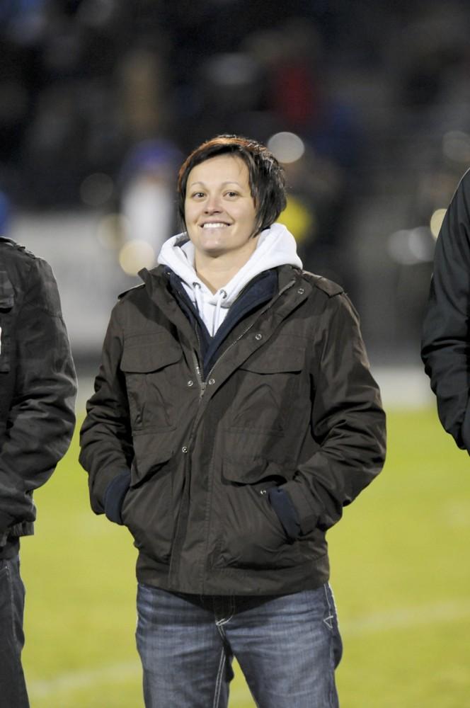 GVL/ Eric Coulter
Hall of Fame inductee Mirela Tutundzic smiles at crowd after being announced during the Homecoming game. 