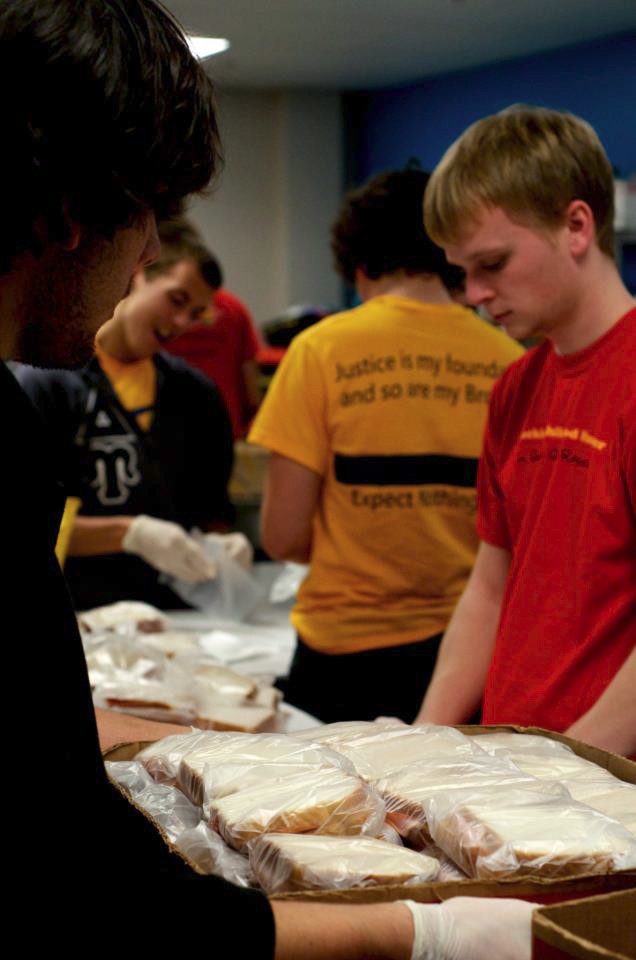 Courtesy Photo / Kids Food Basket
Volunteers make sandwiches for the Kids Food Basket