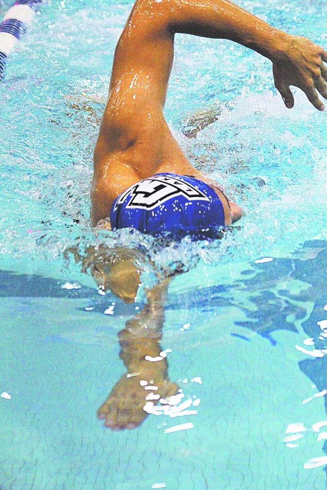 GVL / Robert Mathews
Freshman swimmer Milan Medo at practice.