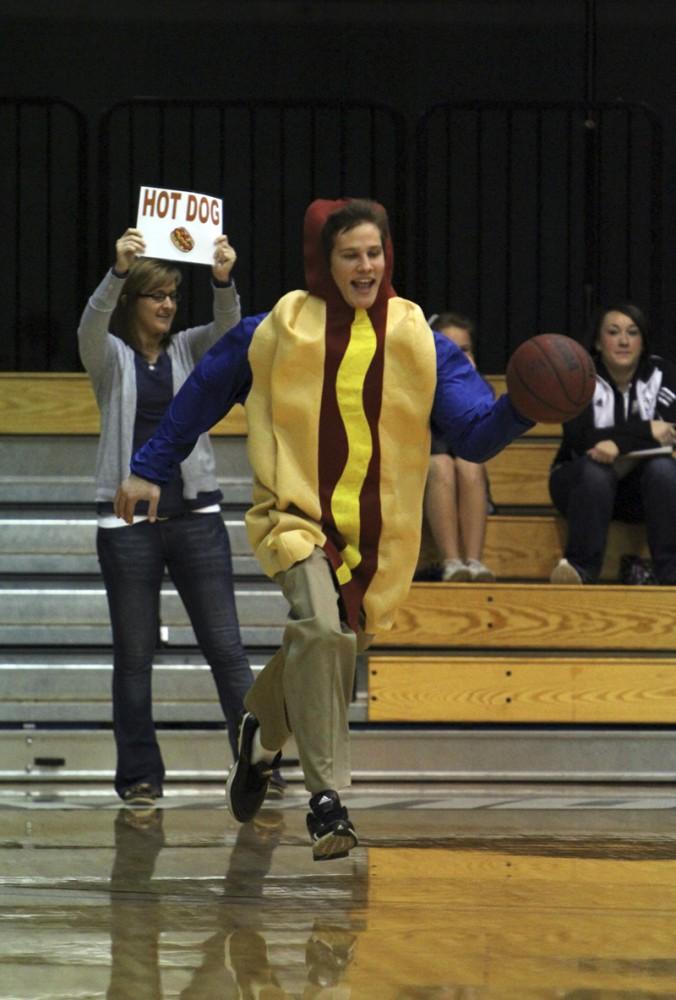 GVL / Robert Mathews / A fan races for a chance to win free Coney Island.