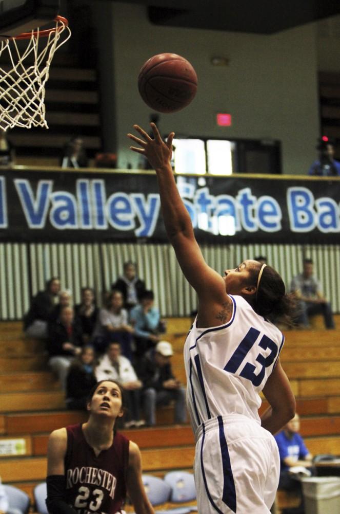 GVL / Robert Mathews Junior guard Brittany Taylor goes up for the shot during Saturday's match up against Rochester College.