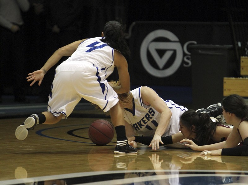 GVL / Robert Mathews / Jasmine Padin (4) hustles for a loose ball.