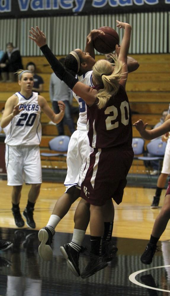 GVL / Robert Mathews  Junior guard Briauna Taylor goes up for the shot during Saturday's match up against Rochester College.