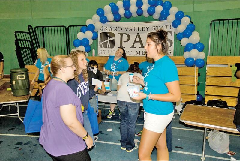 Courtesy Photo/ GVSU Pals Student Mentors
A GVSU Pals Student Mentor talks with students during Campus Life Night.