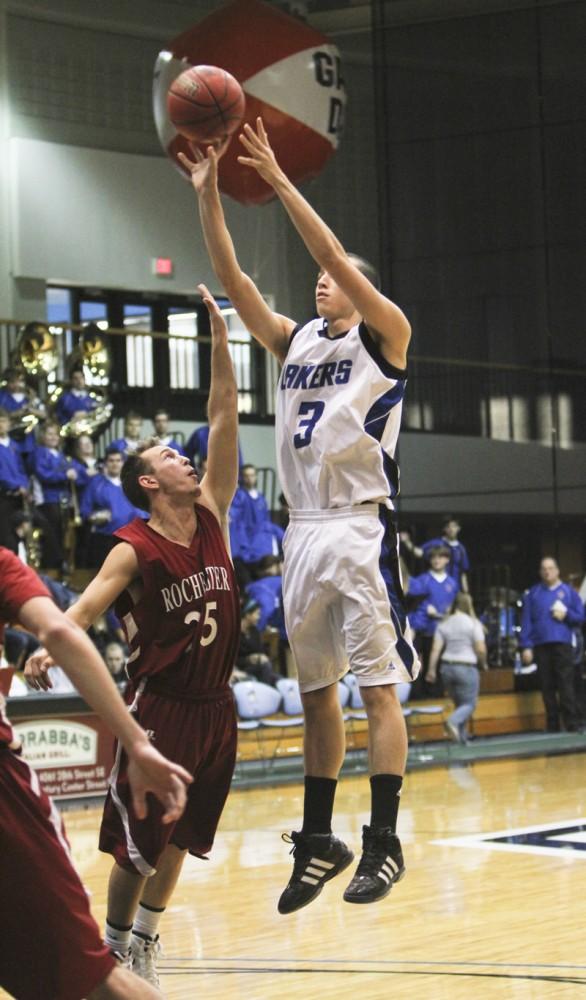 GVL / Robert Mathews
Sophomore guard Dan Newell goes up for a shot during Saturday's game against Rochester College. 