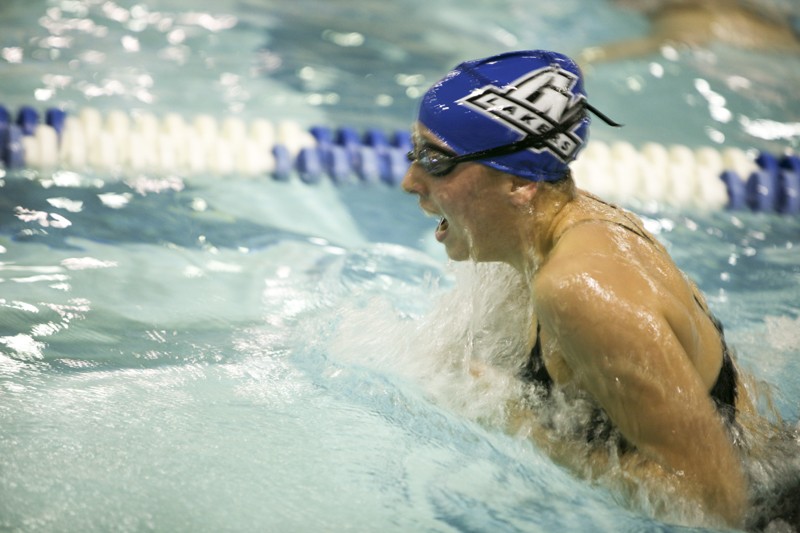 GVL/ Rane Martin
Freshman Danielle Vallier comes up for air while swimming the 200 yard IM at the Lakers meet against Northern Michigan University last Saturday.